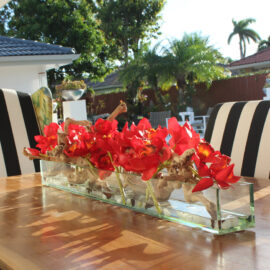48″ Casa Moderna glass plate planter with red Cymbidiums