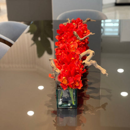 48″ Casa Moderna glass plate planter with red Cymbidiums
